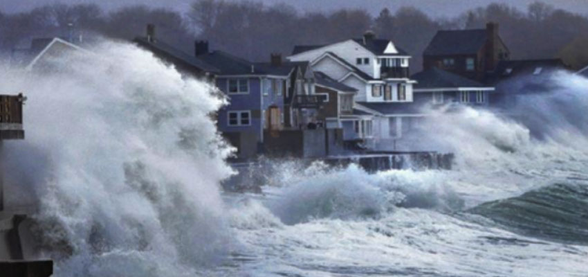 Ocean waves crash over a seawall and into houses along the coast in Scituate, Mass., Thursday, March 7, 2013. Reference: http://www-gazettenet-com.njmu.s5.bt8.net/home/4968871-95/storm-thursday-snow-areas